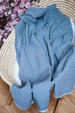Grey polka dot pompon blanket