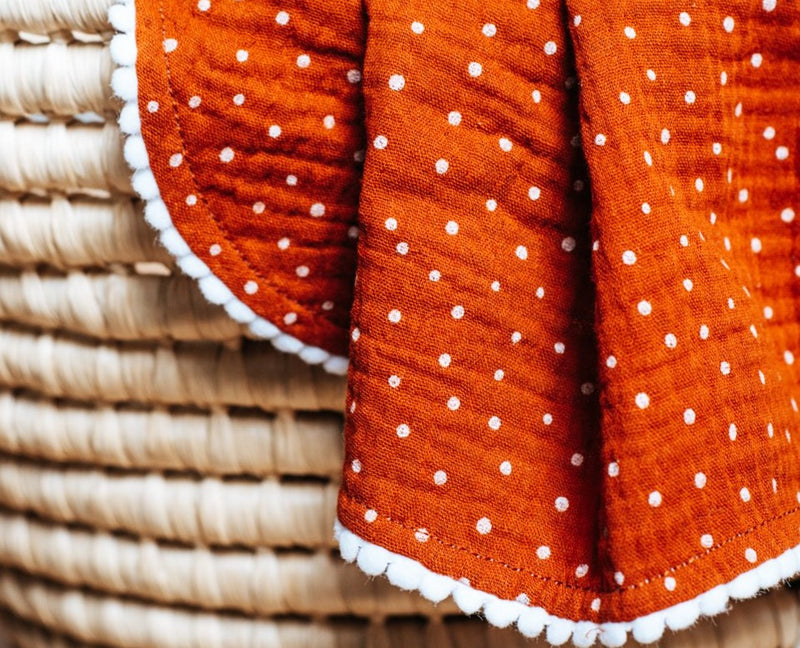 Orange polka dot pompon blanket